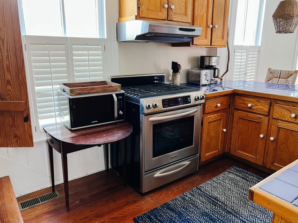 Propane stove, microwave, coffee pot, toaster 