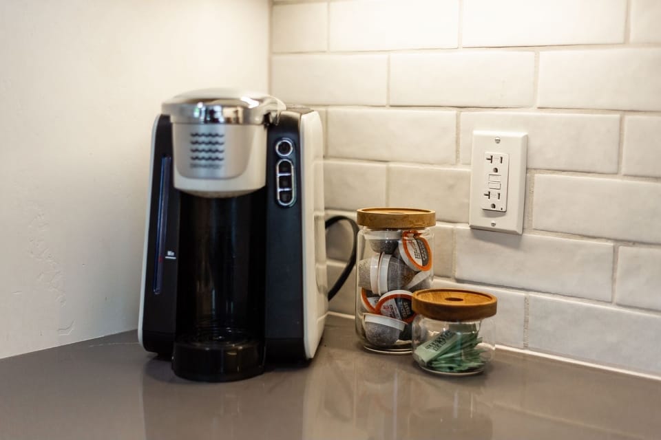Coffee, tea, creamer and sugar waiting for you in the morning!