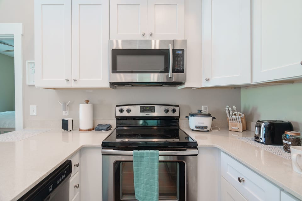 Fully furnished kitchen  to make meals for your family and friends.