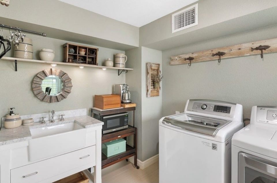Laundry room with complimentary detergent.