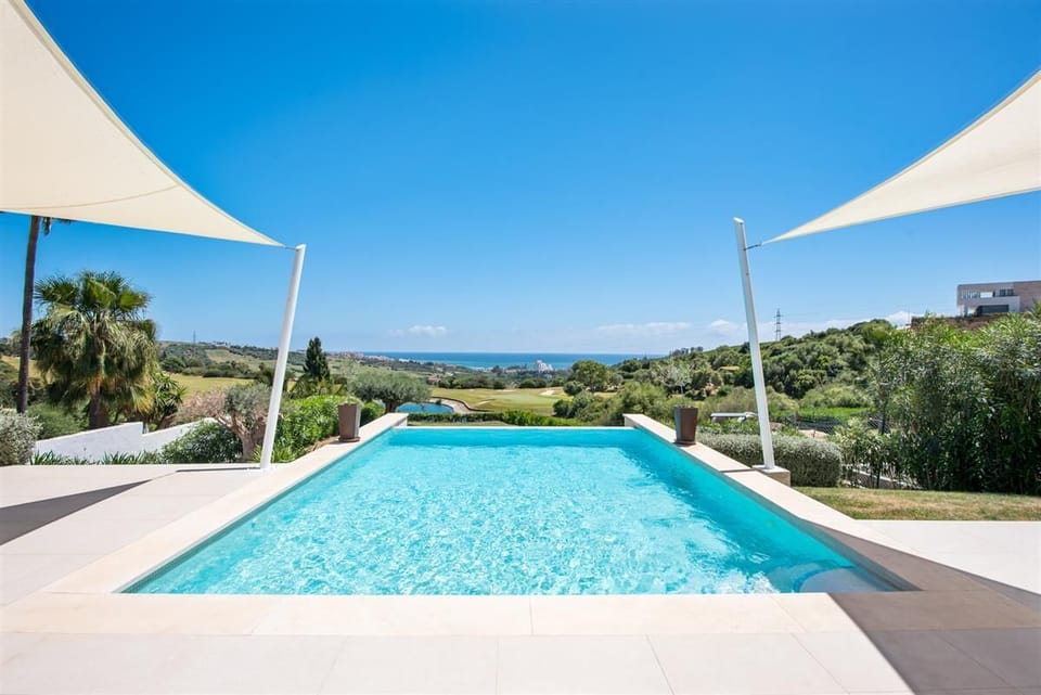 Stunning private pool with magnificent views to the gardens and sea