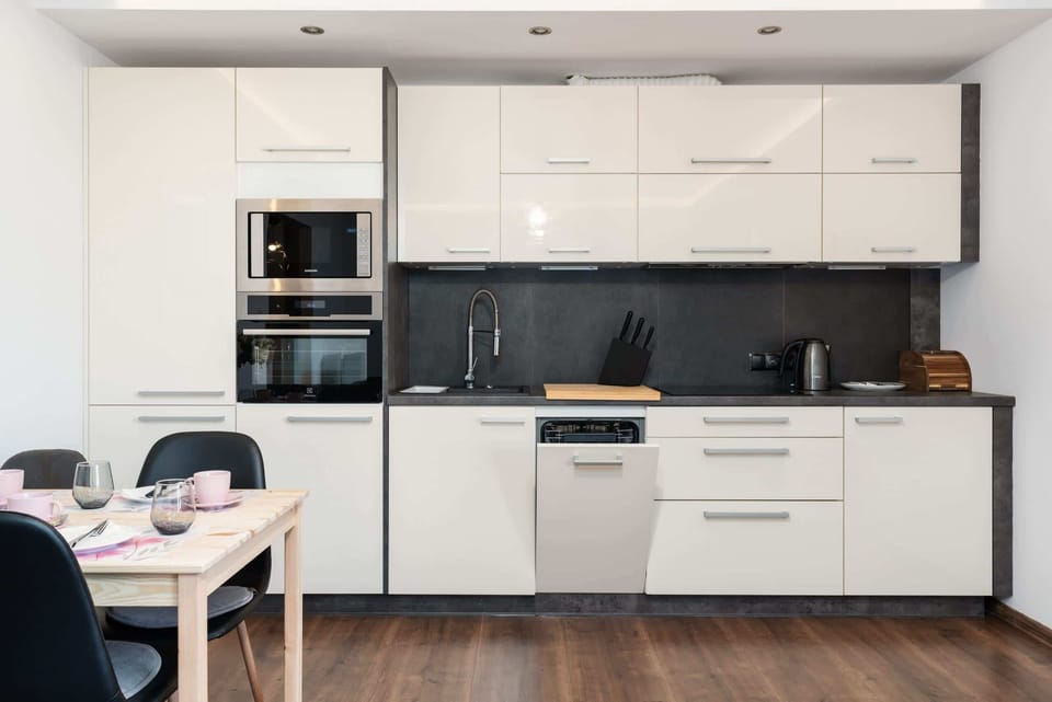 The fully equipped kitchenette includes everything you need for a home-cooked meal.