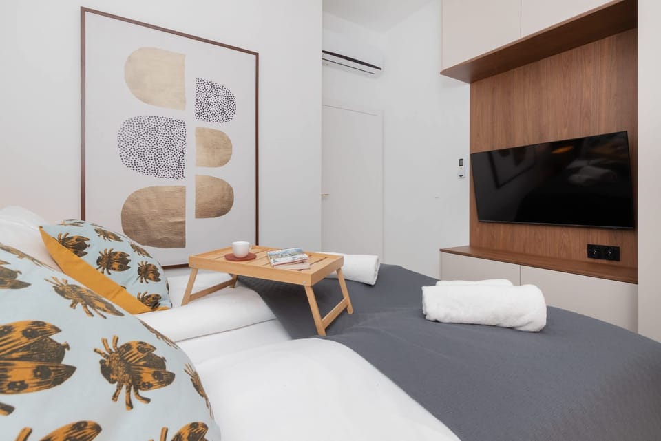 The bedroom features a luxurious double bed for a restful night's sleep. 