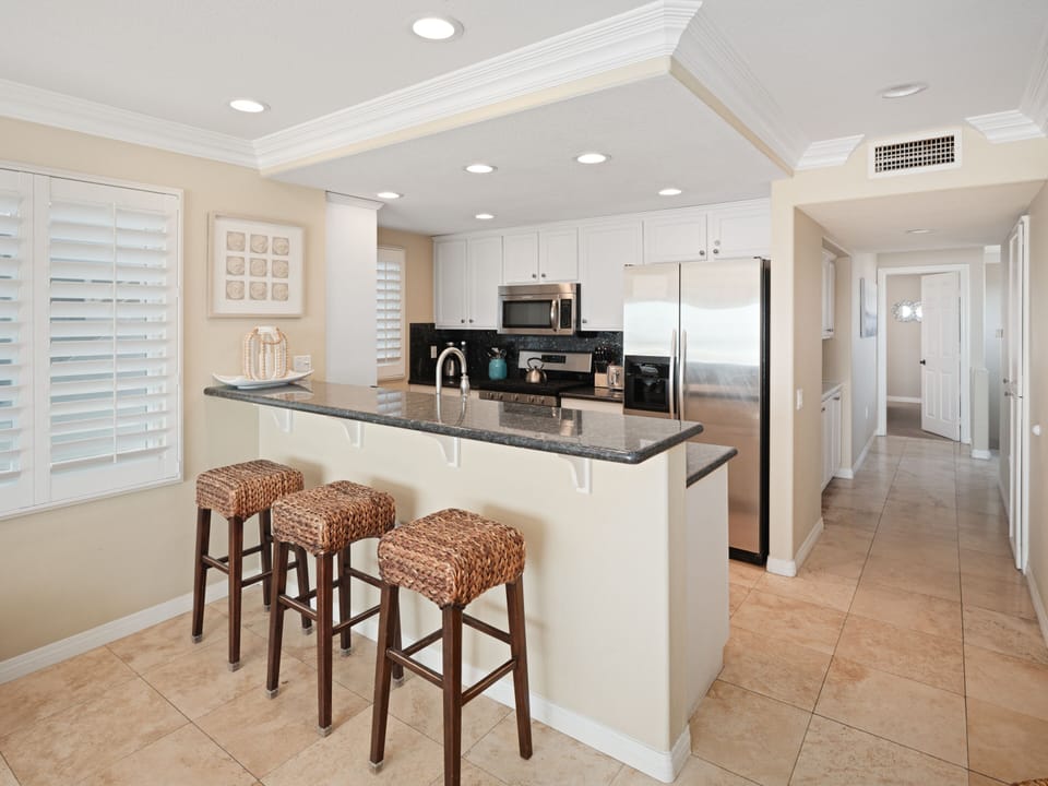 Marble countertops, sleek finishes, and fully stocked with tableware, cookware, and glassware for a refined cooking experience.