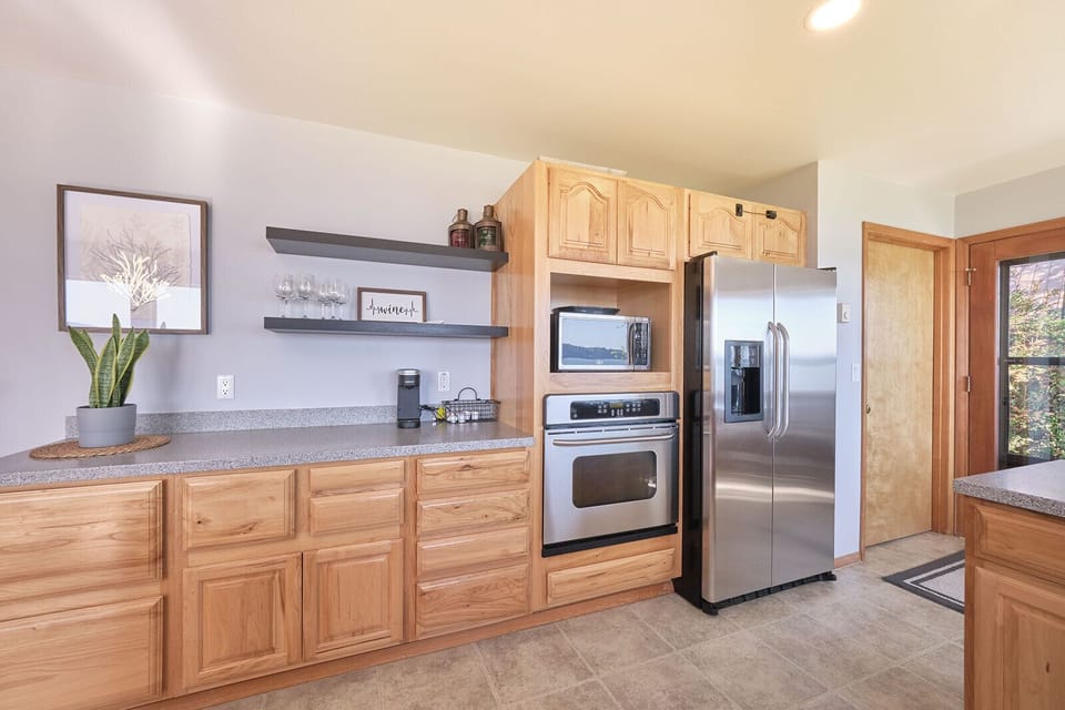 Modernized kitchen with upgraded appliances.