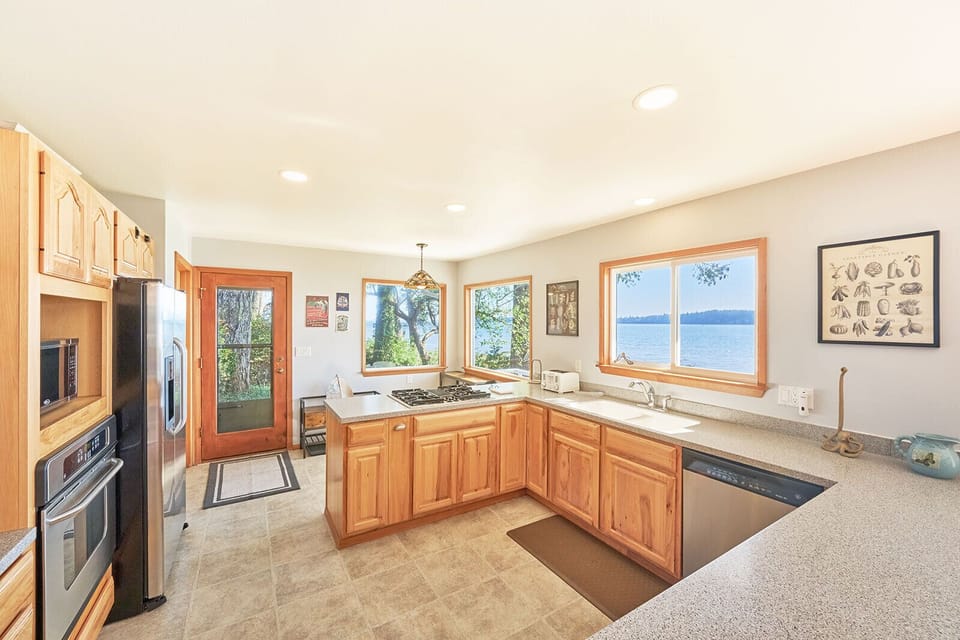 Indulge in culinary delights with the built-in stove top, offering a unique cooking experience where you can savor bay views while preparing all your meals.