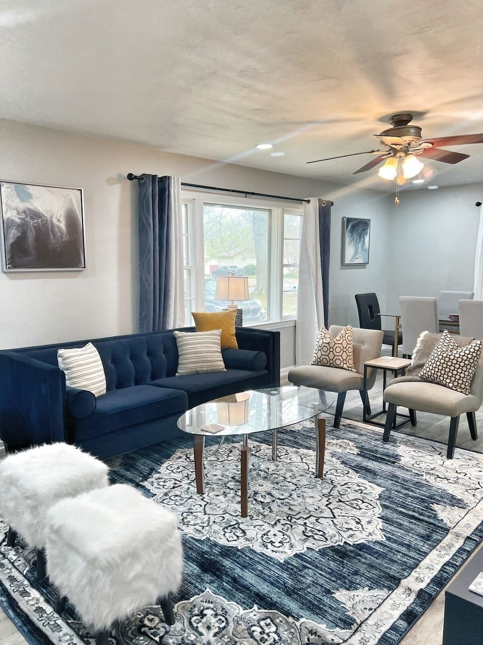 Bright, open living area with plush seating and smart TV — perfect for relaxing together.