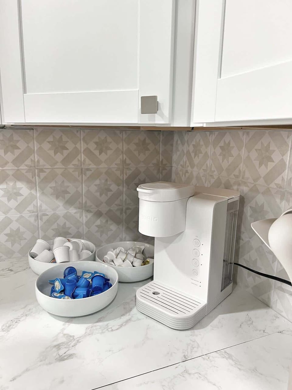 Start your mornings right at the stocked coffee bar — mugs, K-Cups, and more.