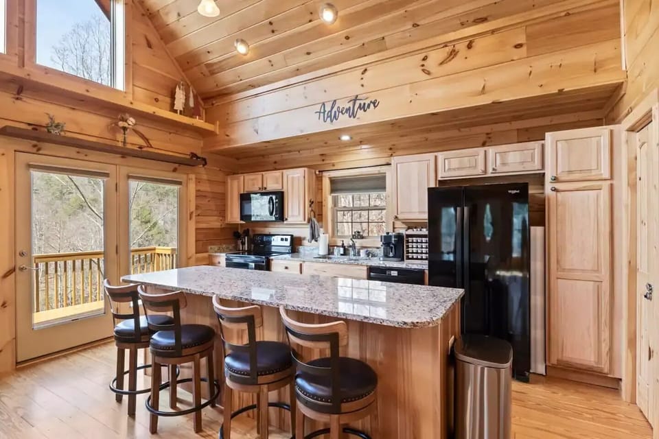 Open kitchen with access to deck.