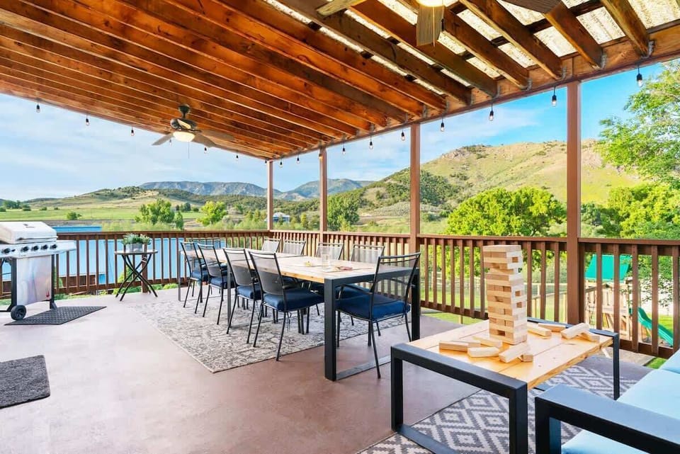 The covered patio and large dining table is perfect for large group meals (and playing games).