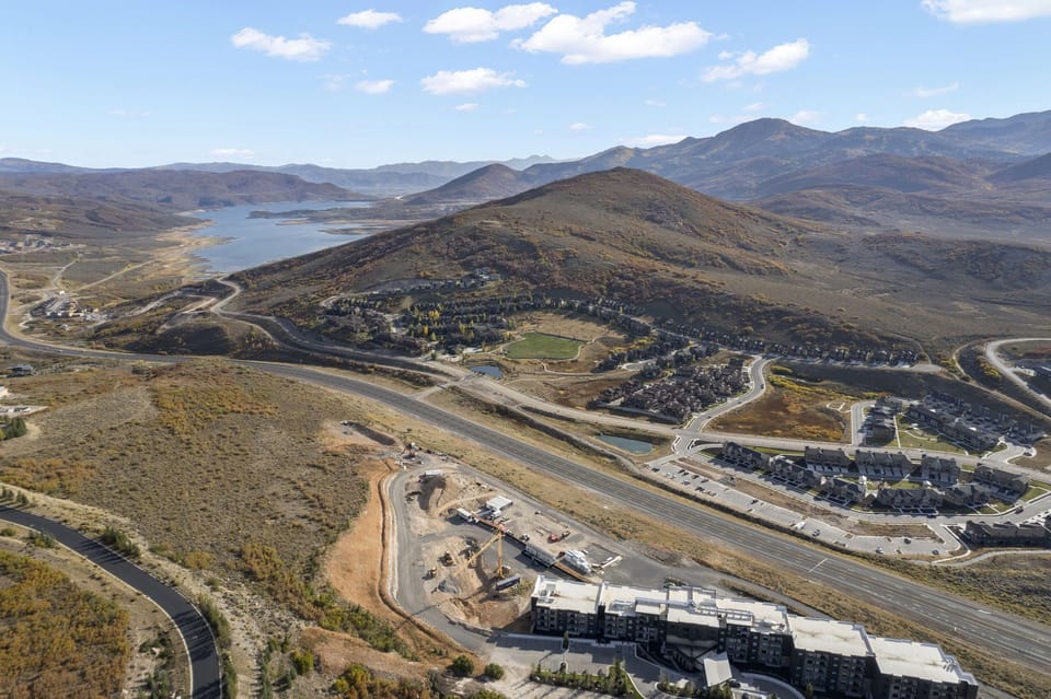 Aerial View of Townhome Community + Jordanelle Reservoir + Deer Valley