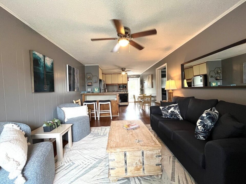 view back toward the kitchen.  Includes charging station