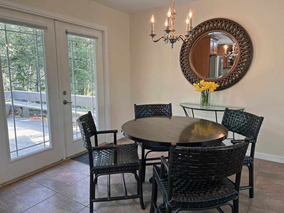 Dining area with access to deck