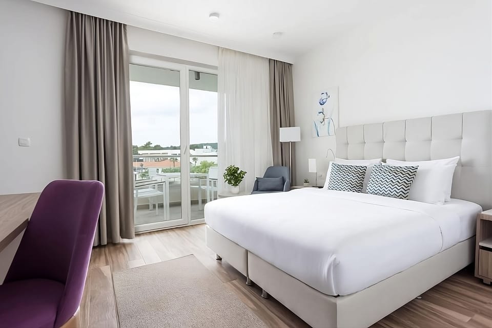 Relax together in a roomy suite with separate sleeping spaces.