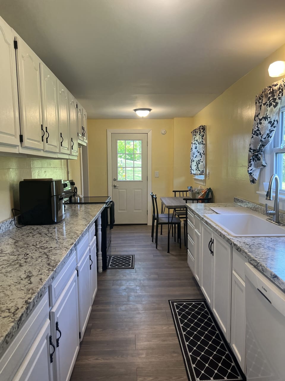 Kitchen - Door at the end leads to the Side Deck