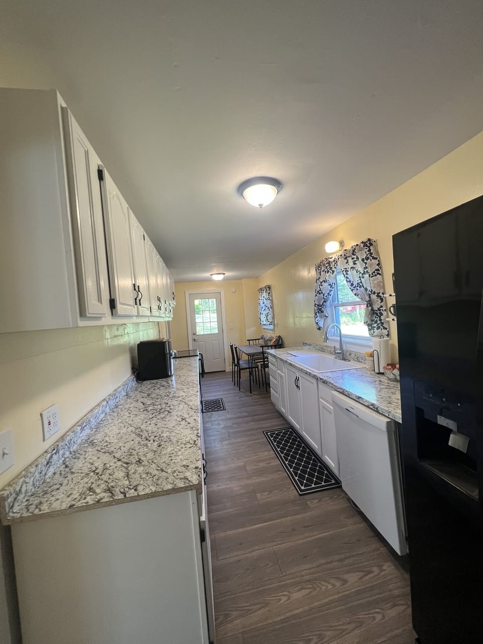 Kitchen - Door at the end that leads to the Side Deck 