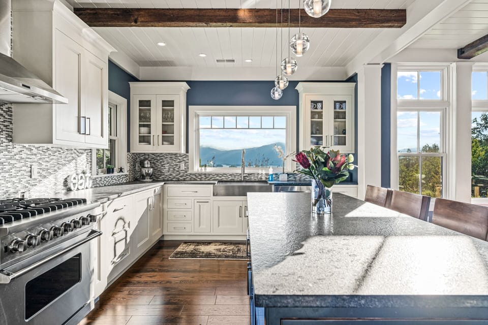 This home has an open-concept gourmet kitchen with top-of-the-line appliances