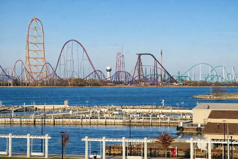Behold the breathtaking view of Cedar Point from your condo! Marvel at the towering roller coasters and vibrant attractions that dot the horizon, promising thrilling adventures.   With every glance, feel the excitement!