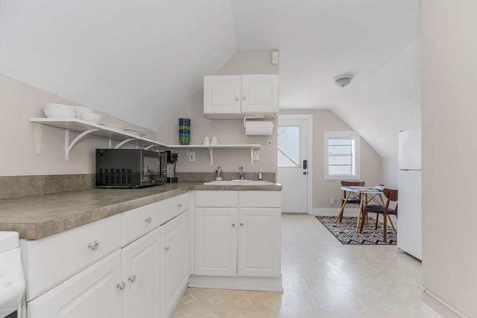 The second kitchen is located on the 3rd floor, creating a self sufficient studio apartment. 