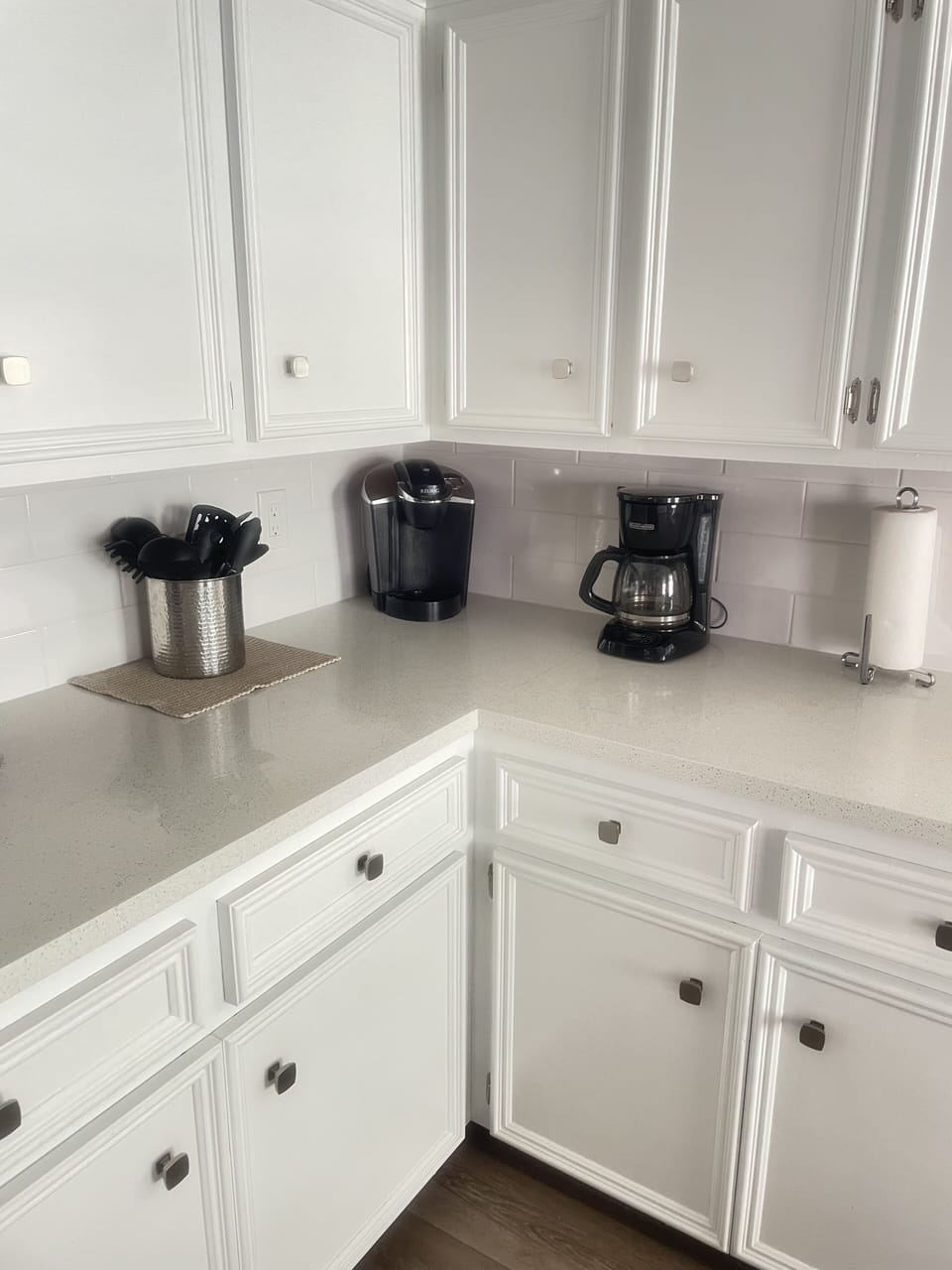 Coffee drip and kuerig along with a tea kettle