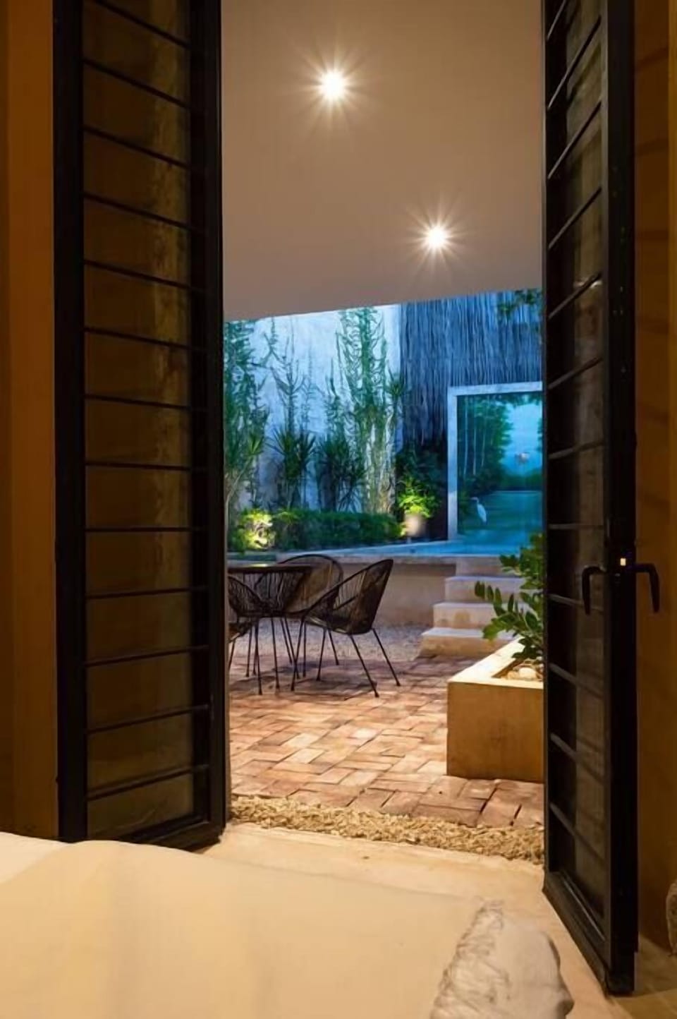 Door from downstairs bedroom to pool