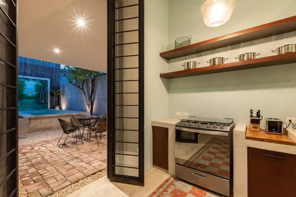 Door from kitchen leading to pool