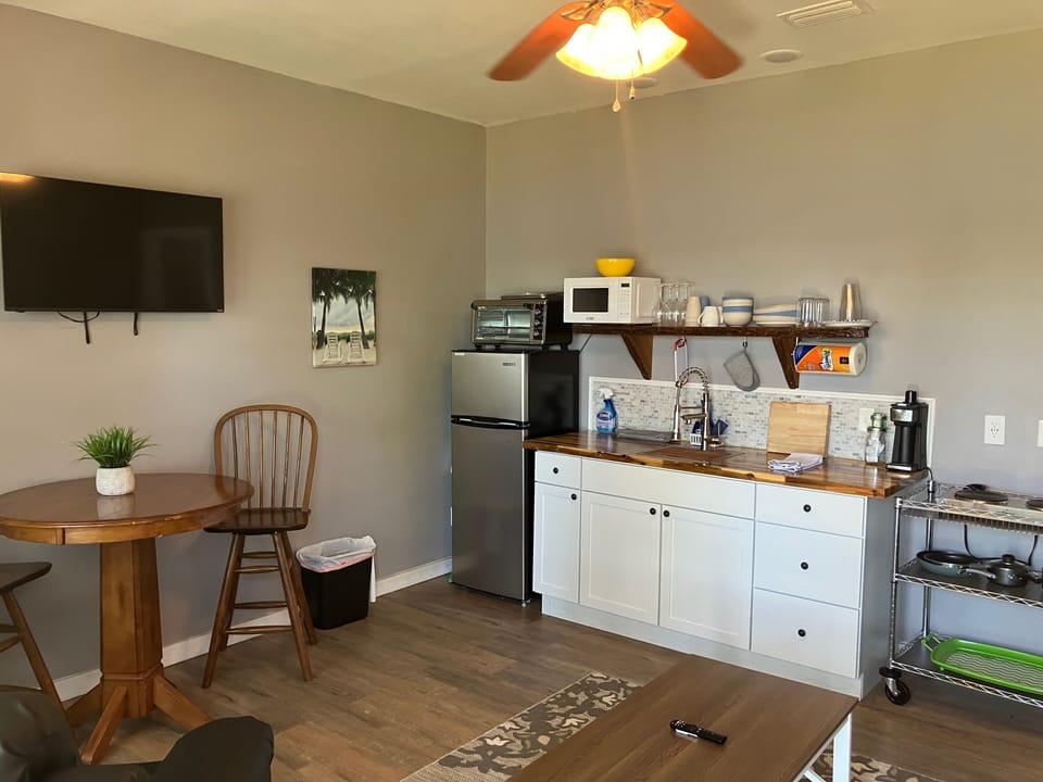 Unit: Bluegill
King bed
Full bathroom, kitchenette, living room & dining area