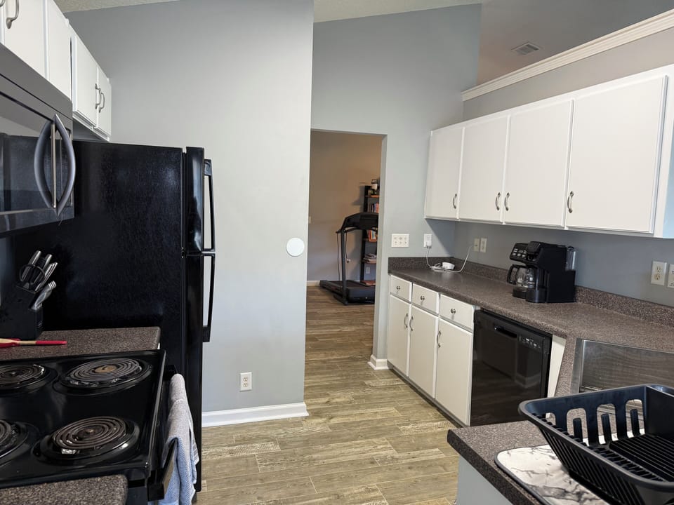 Kitchen with keurig and regular coffee machines