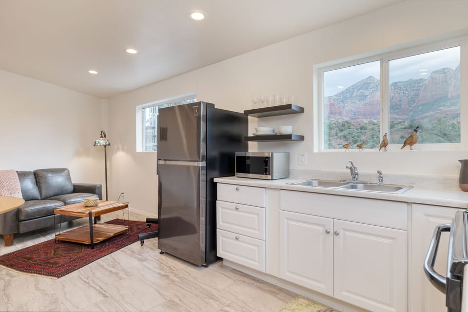 Guest House 1 is a one-bedroom space with a kitchenette and sitting area.