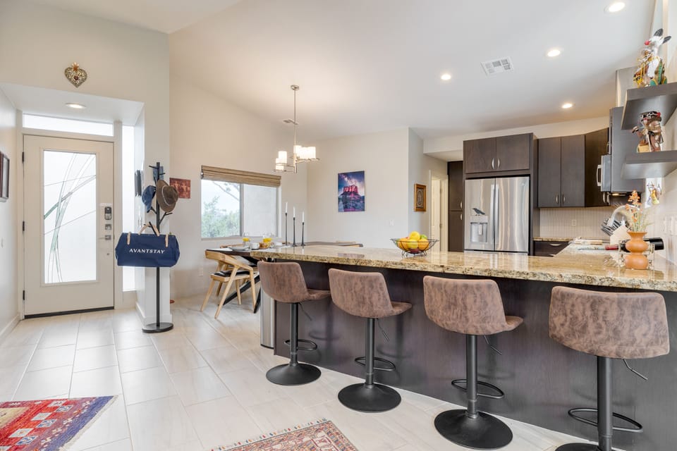 Main House kitchen is fully equipped with additional barstool seating at the counter.