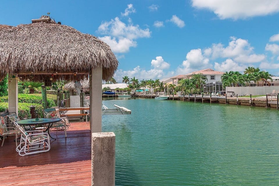 Tiki hut and wide clean canal