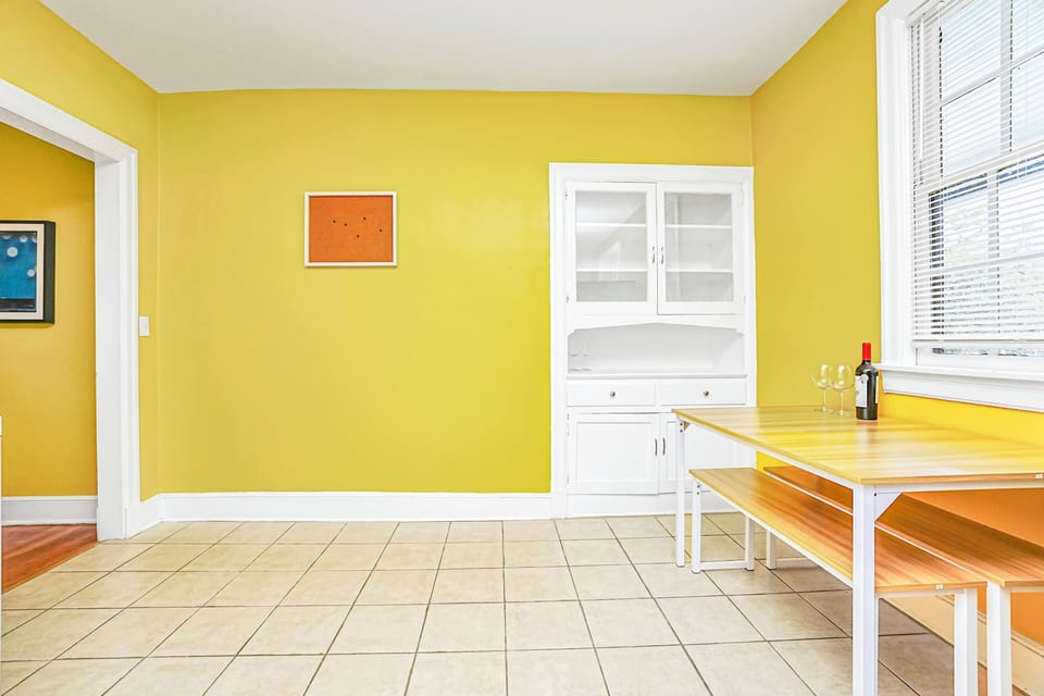 Sleek Design Meets Communal Warmth in Our Dining Room.
