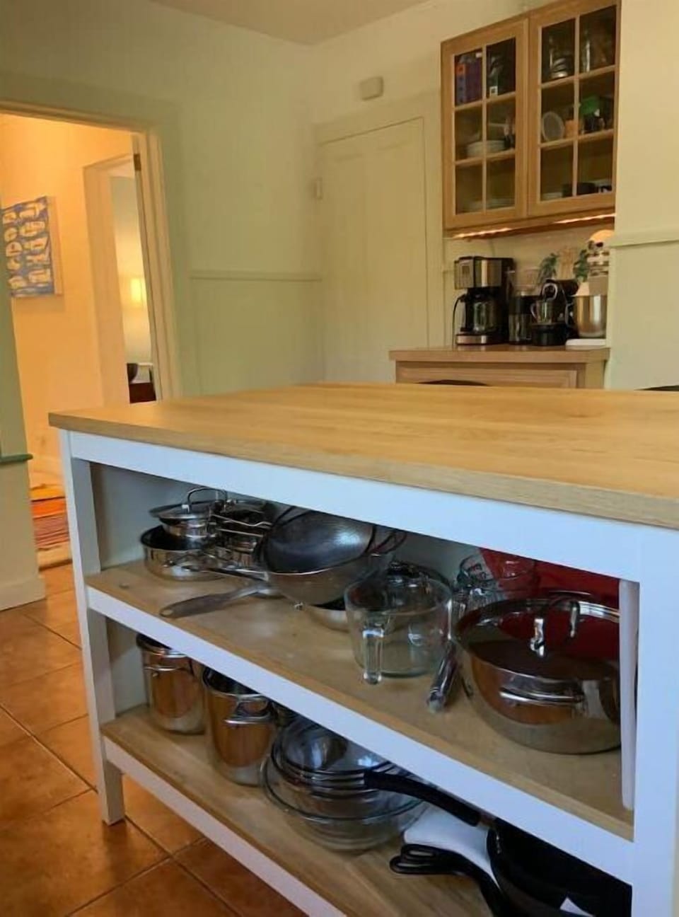 Additional stainless steel and cast iron cookware, Kitchenaide mixer, Cuisnart.