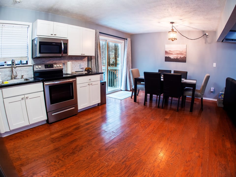 Dining area w seating for 10 & kitchen w all the tools to cook a delicious meal