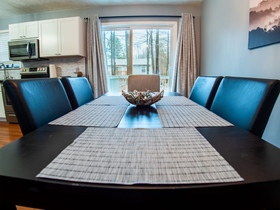 Dining area w seating for 10 & kitchen w all the tools to cook a delicious meal