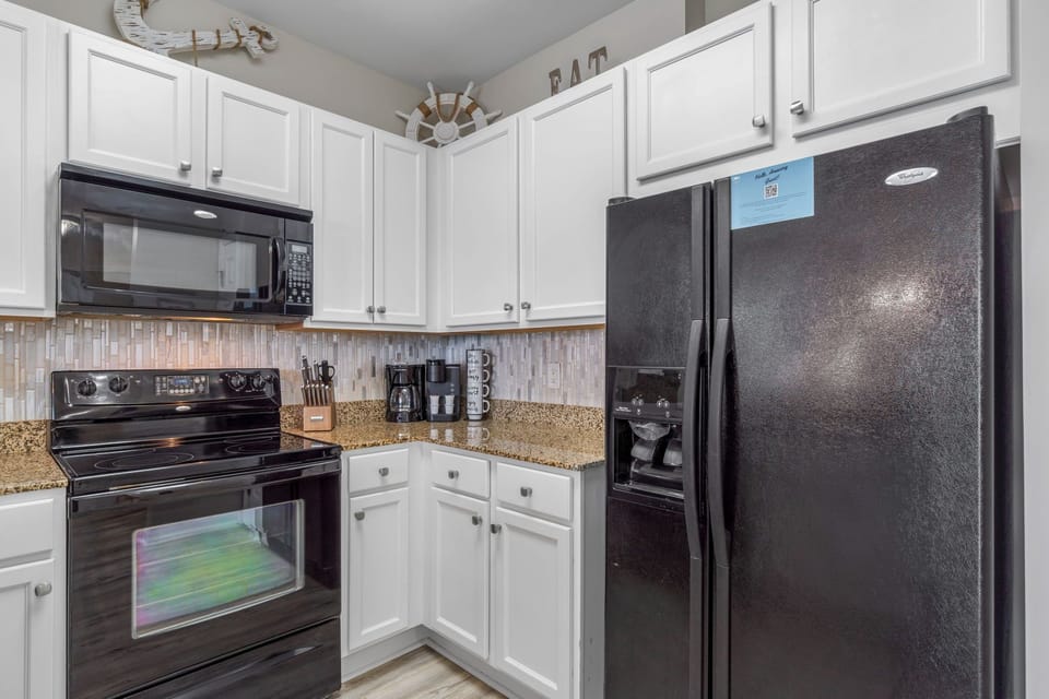 Spacious kitchen with all of the comforts of home, Refrigerator w/ Ice and water