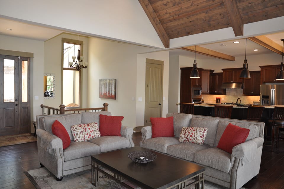 Living room opens to kitchen