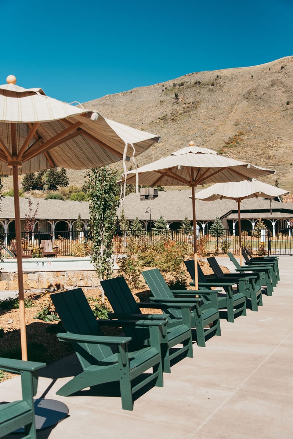 Lounge in the sun with easy steps to the pool.