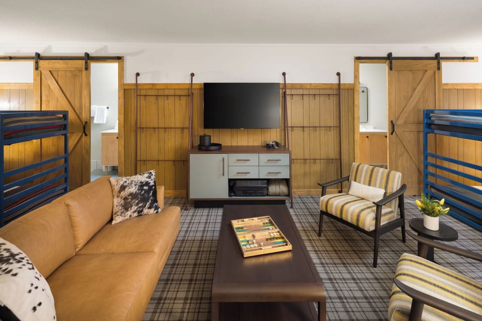 Unwind together on the sofa after adventure-filled mountain days.