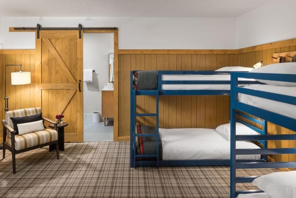 Stretch out in cozy bunks with warm, rustic charm.
