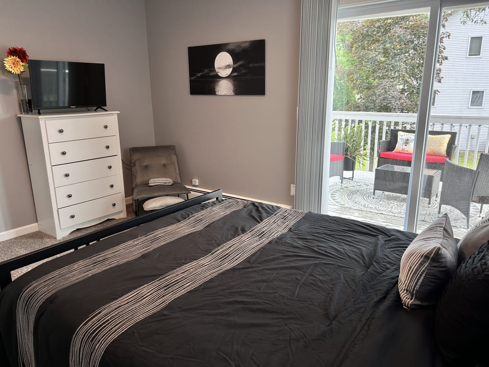 Bedroom with deck and television.