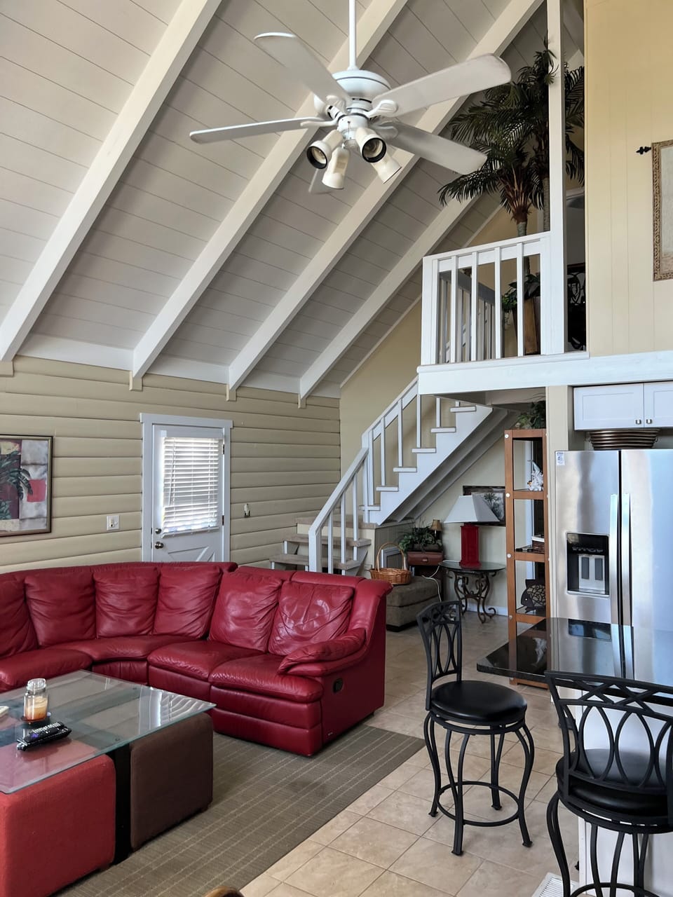 Stairs to master suite & hall to rooms
