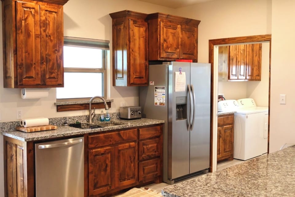 Full Kitchen facing back yard
