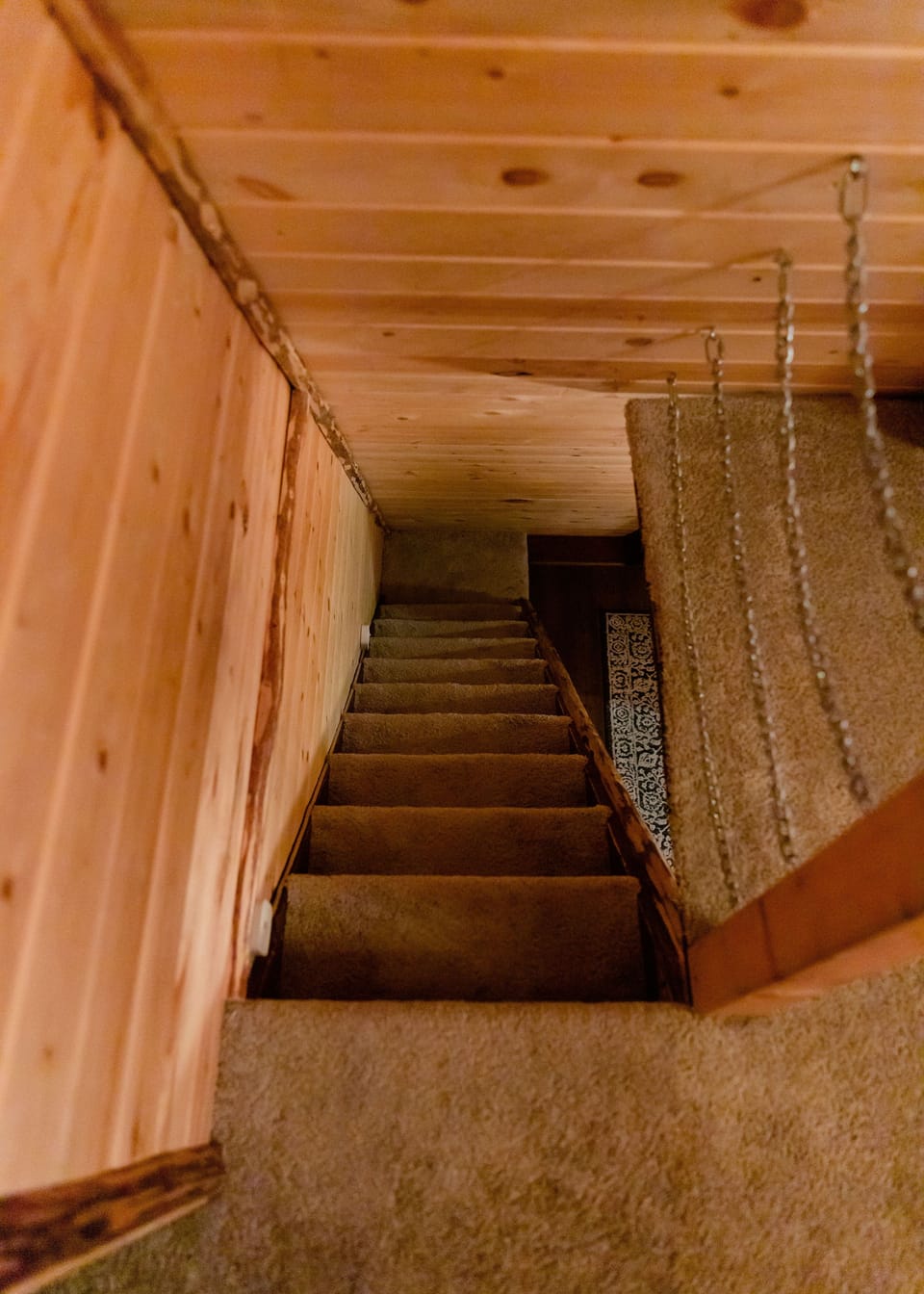 stairs that lead to the upstairs (both bedrooms)