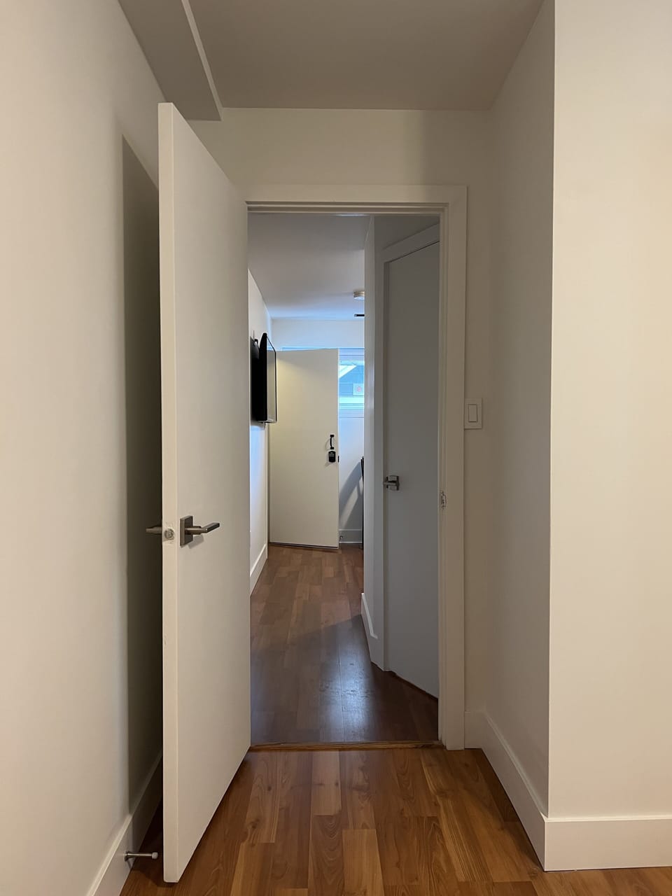 Outlook from bedroom door to living room.
