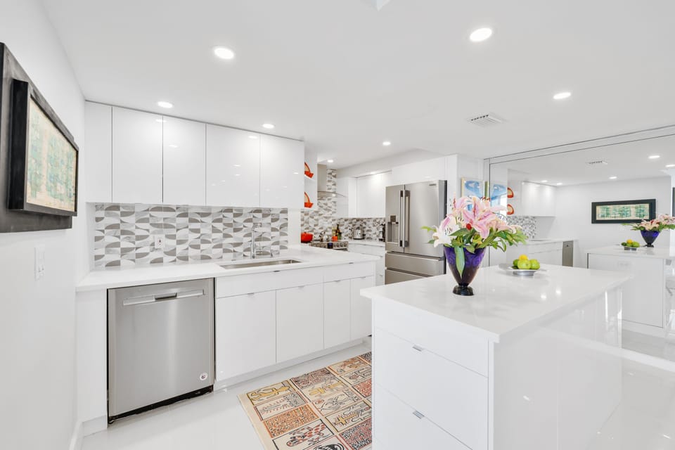 Kitchen includes DW, stove with air fry, french door refrig with wine drawer.