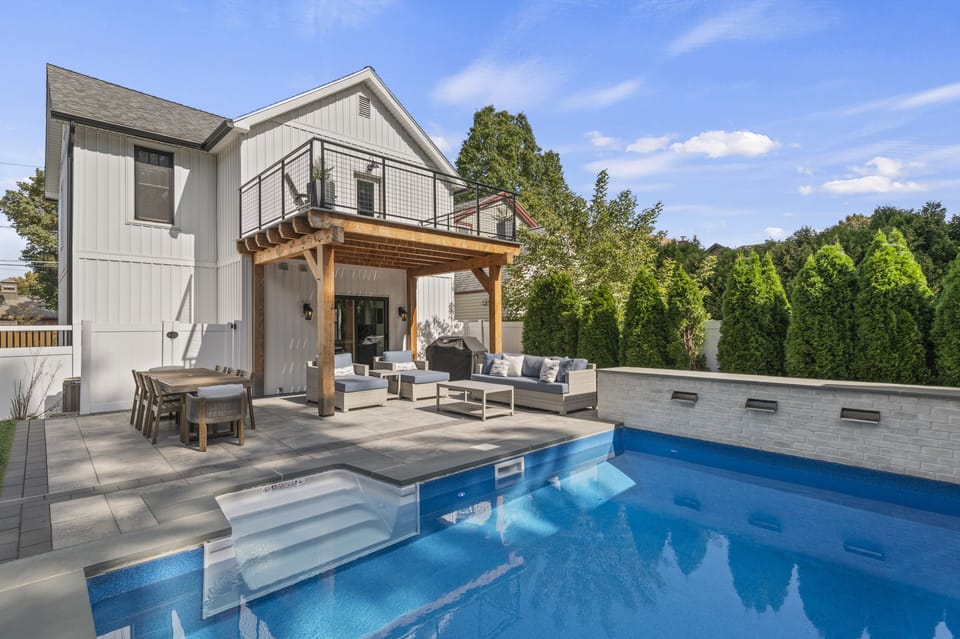Backyard patio with heated pool