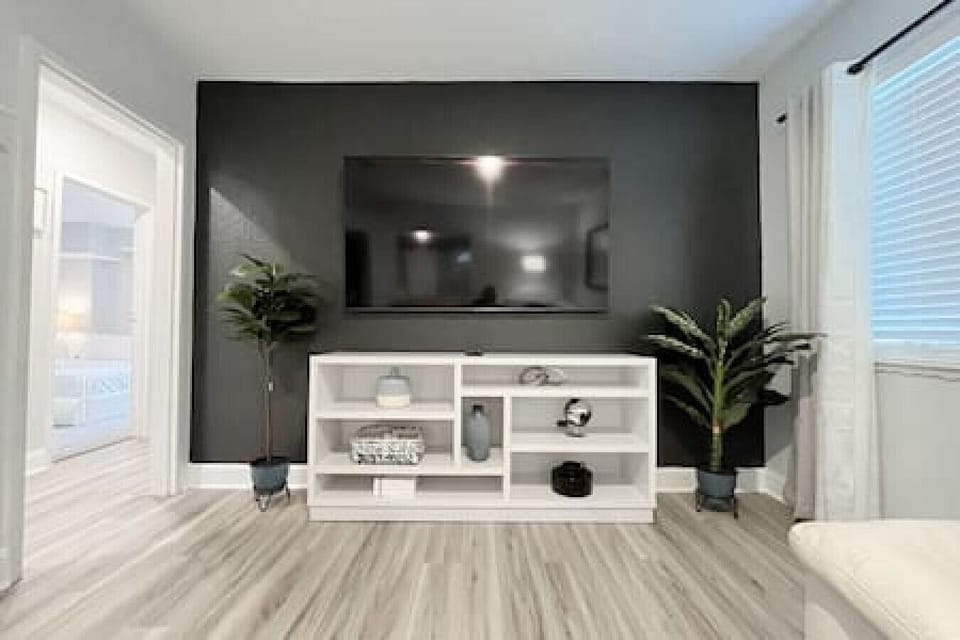 Smart TV Over a Beautifully Decorated TV Stand