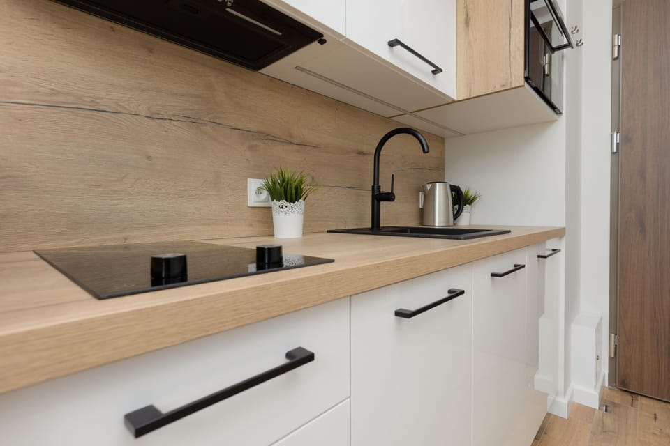 The kitchenette's practical layout maximizes space and functionality.