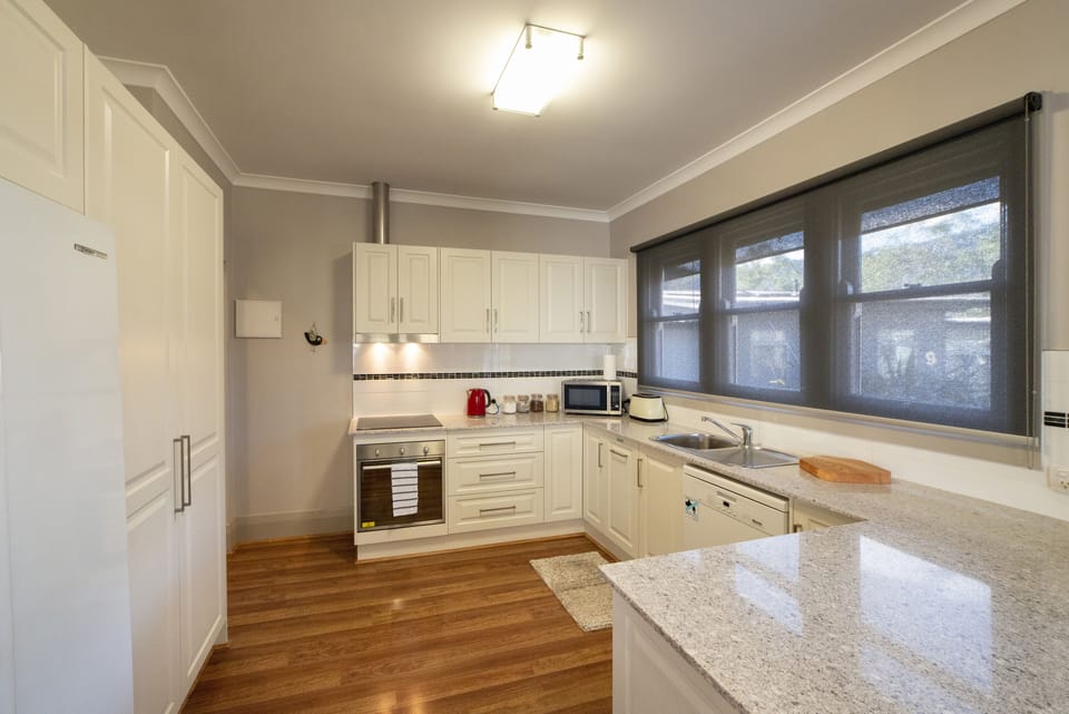 Experience culinary joy in our spacious, fully equipped kitchen.
